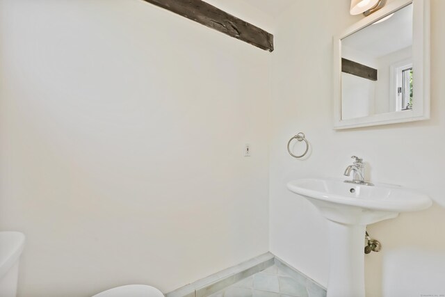15 Grumman Ave, Norwalk, CT 06851 - bathroom featuring toilet and tile patterned floors