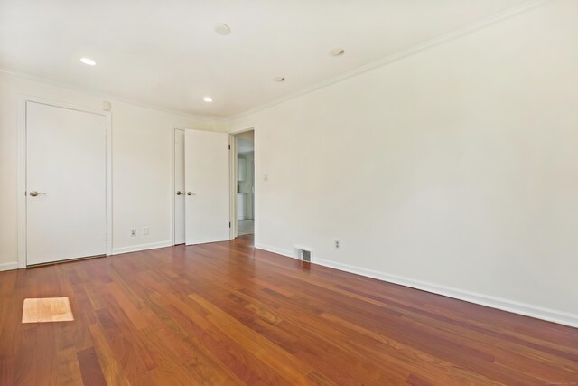 15 Grumman Ave, Norwalk, CT 06851 - unfurnished bedroom with ornamental molding, wood finished floors, and recessed lighting