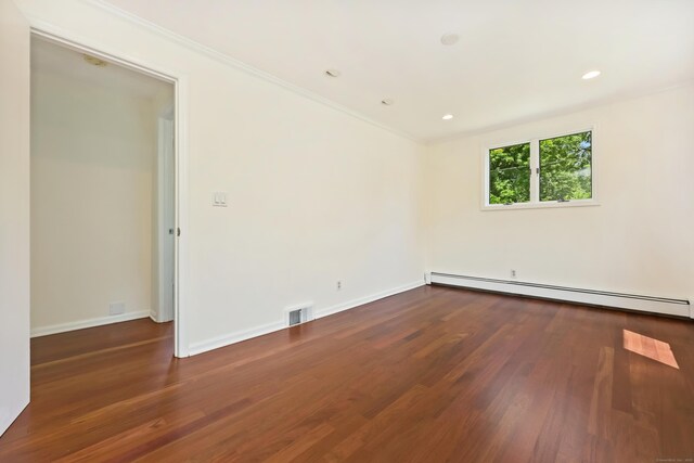 15 Grumman Ave, Norwalk, CT 06851 - spare room featuring baseboard heating, wood finished floors, ornamental molding, and recessed lighting