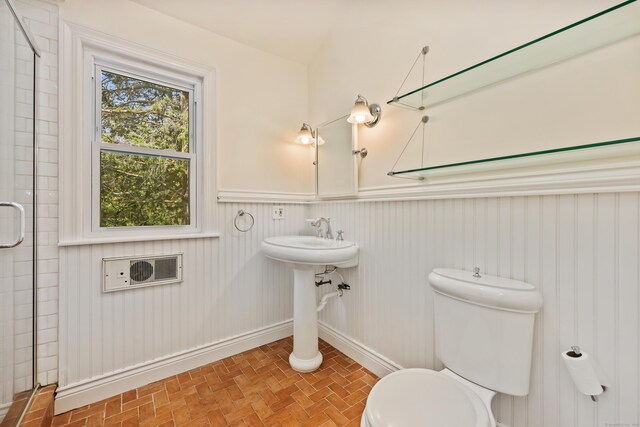 15 Grumman Ave, Norwalk, CT 06851 - bathroom with a wainscoted wall and tiled shower