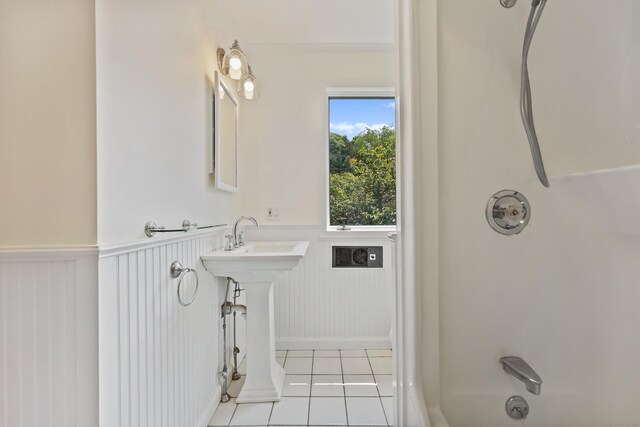 15 Grumman Ave, Norwalk, CT 06851 - full bath with tile patterned flooring, a wainscoted wall, and shower / tub combination