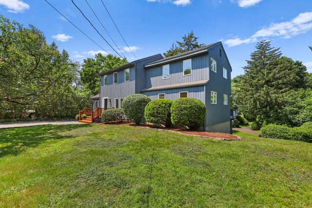 15 Grumman Ave, Norwalk, CT 06851 - view of front of property featuring a front yard