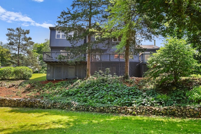 15 Grumman Ave, Norwalk, CT 06851 - back of property with a wooden deck and a lawn