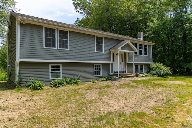 36 Harris Road Ext, Salem, CT 06420 - split foyer home with a chimney and a front yard