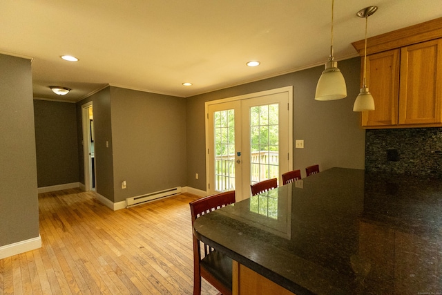 36 Harris Road Ext, Salem, CT 06420 - dining space featuring a baseboard radiator, ornamental molding, light wood-style flooring, french doors, and baseboards