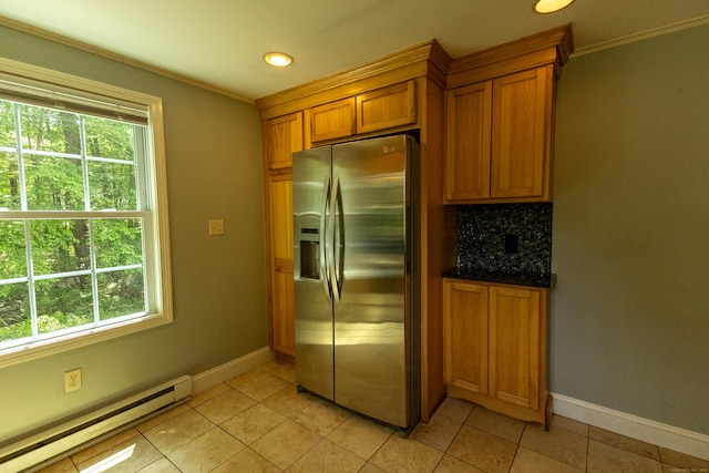 36 Harris Road Ext, Salem, CT 06420 - kitchen with stainless steel refrigerator with ice dispenser, a baseboard radiator, healthy amount of natural light, brown cabinets, and ornamental molding