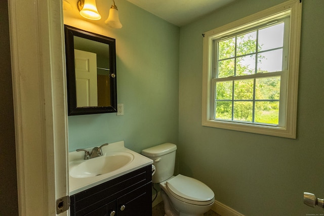 36 Harris Road Ext, Salem, CT 06420 - half bath with plenty of natural light, vanity, toilet, and baseboards