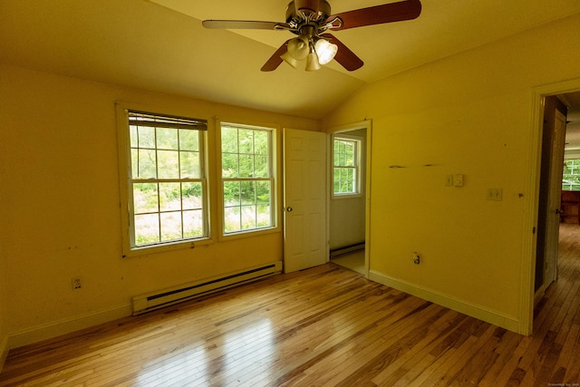 36 Harris Road Ext, Salem, CT 06420 - unfurnished room with a baseboard radiator, hardwood / wood-style flooring, lofted ceiling, and plenty of natural light
