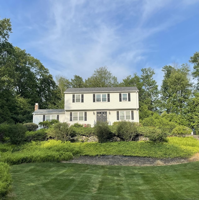 22 Bobolink Ln, Somers, CT 06071 - colonial house featuring a chimney and a front yard