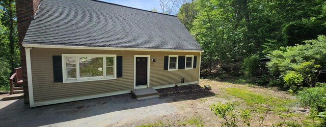 552 Squaw Rock Rd, Plainfield, CT 06354 - view of front of property featuring a chimney and a shingled roof