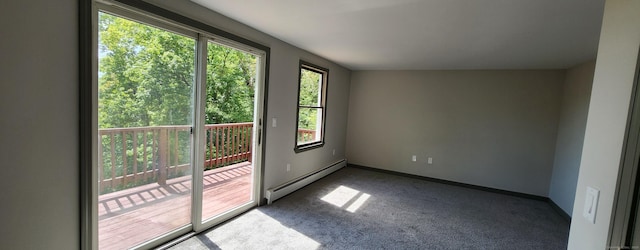 552 Squaw Rock Rd, Plainfield, CT 06354 - carpeted empty room featuring a baseboard heating unit and baseboards