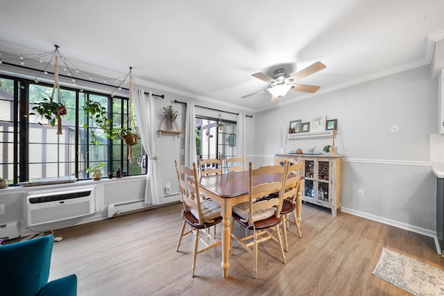 50 Aiken St Apt 463, Norwalk, CT 06851 - dining room featuring a baseboard radiator, a wall mounted air conditioner, crown molding, wood finished floors, and ceiling fan