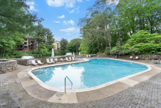 50 Aiken St Apt 463, Norwalk, CT 06851 - community pool with a patio and view of scattered trees