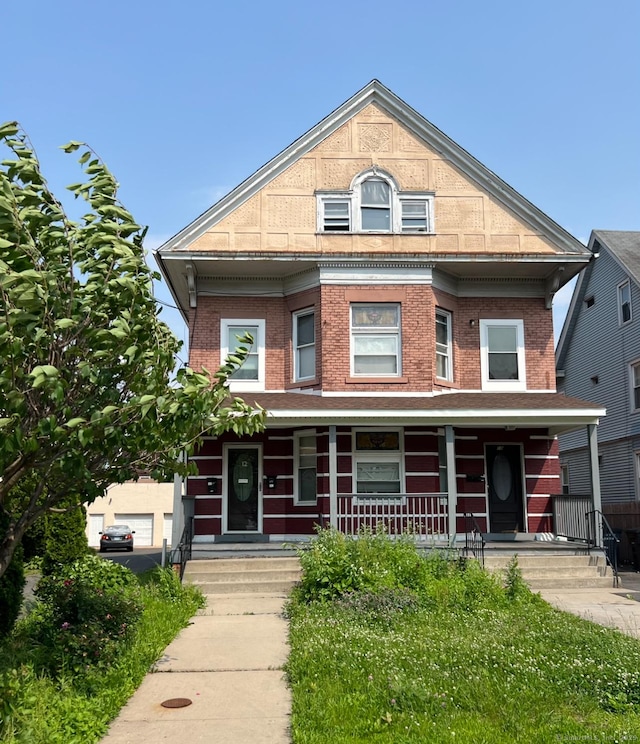 10 Burton St, Hartford, CT 06154 - view of front of house featuring covered porch and brick siding