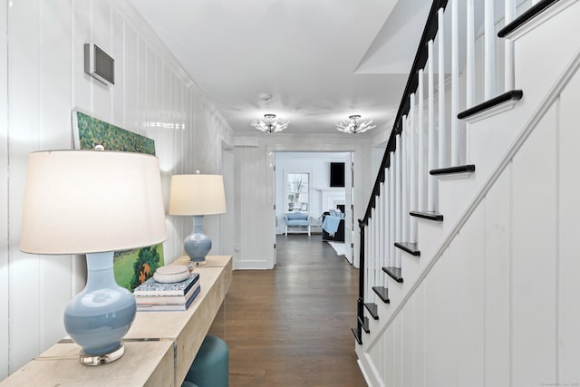 15 Mill Rd, New Canaan, CT 06840 - foyer with dark wood-style floors, stairway, and a chandelier