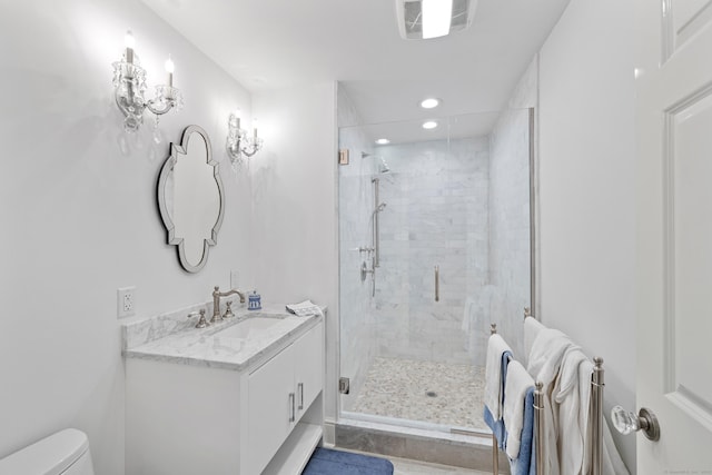 15 Mill Rd, New Canaan, CT 06840 - bathroom featuring vanity, toilet, a stall shower, and recessed lighting