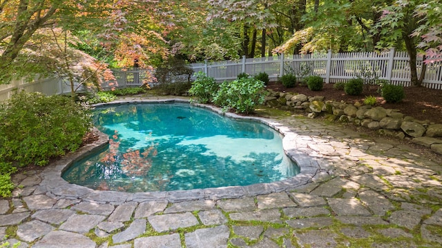 15 Mill Rd, New Canaan, CT 06840 - view of pool featuring a fenced backyard
