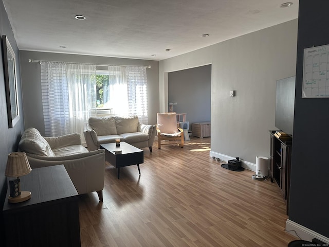 184 Kennedy Dr Unit 184, Bridgeport, CT 06606 - living room featuring baseboards, wood finished floors, and recessed lighting