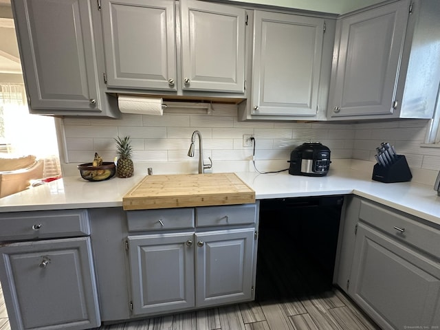 184 Kennedy Dr Unit 184, Bridgeport, CT 06606 - kitchen featuring gray cabinets, backsplash, and light countertops