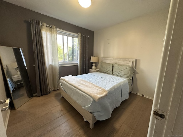 184 Kennedy Dr Unit 184, Bridgeport, CT 06606 - bedroom featuring wood-type flooring and baseboards