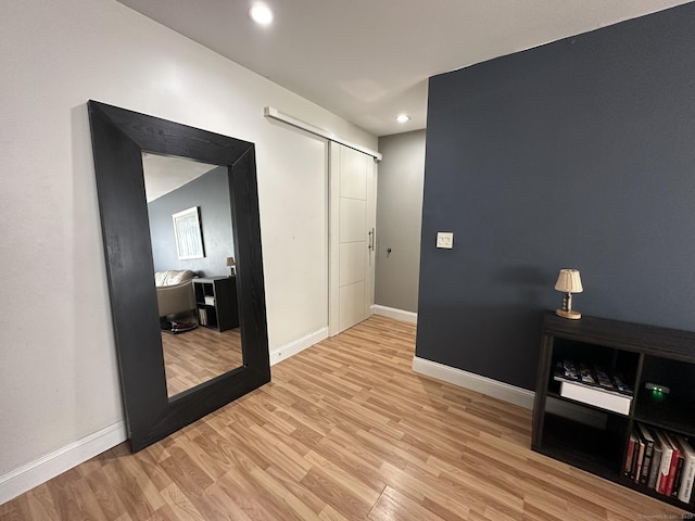 184 Kennedy Dr Unit 184, Bridgeport, CT 06606 - unfurnished room featuring light wood finished floors, baseboards, and recessed lighting