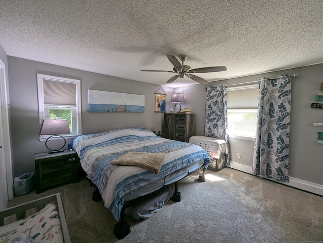 51 Isleib Rd, Marlborough, CT 06447 - bedroom featuring multiple windows, carpet floors, ceiling fan, a textured ceiling, and baseboards
