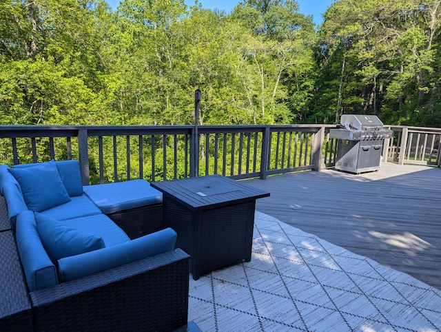 51 Isleib Rd, Marlborough, CT 06447 - wooden terrace featuring an outdoor hangout area, a grill, and a forest view