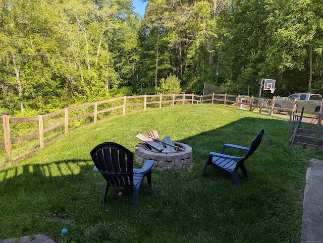 51 Isleib Rd, Marlborough, CT 06447 - view of yard featuring an outdoor fire pit and a view of trees