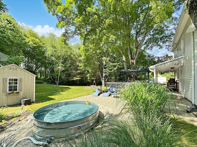 276 Boston Post Rd, East Lyme, CT 06333 - view of grassy yard featuring view of wooded area and a patio