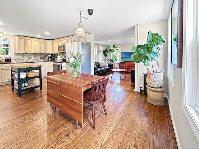 276 Boston Post Rd, East Lyme, CT 06333 - dining room with light wood-type flooring, recessed lighting, and baseboards