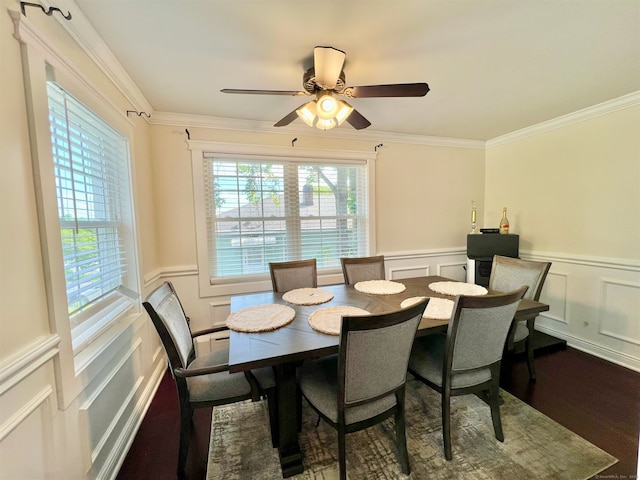 55 Lancaster St, Watertown, CT 06779 - dining room with a decorative wall, wainscoting, ornamental molding, ceiling fan, and wood finished floors