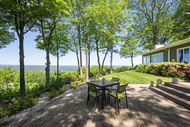 29 Montevideo Rd, Avon, CT 06001 - deck with a patio area, outdoor dining space, and a lawn