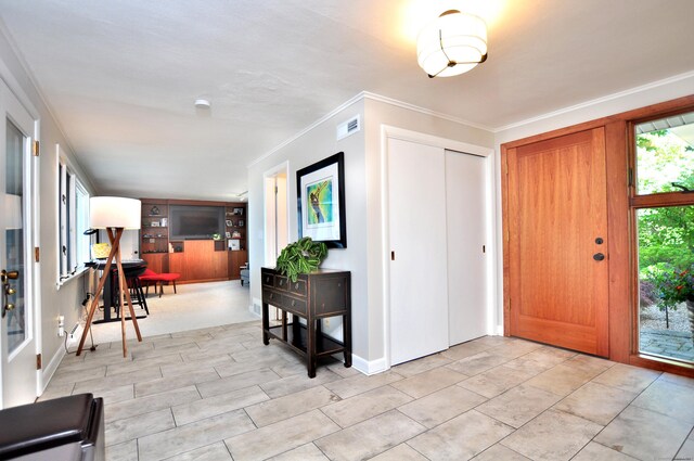 29 Montevideo Rd, Avon, CT 06001 - entrance foyer with baseboards and crown molding