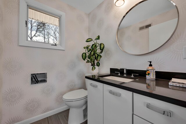 29 Montevideo Rd, Avon, CT 06001 - bathroom with wallpapered walls, vanity, toilet, and baseboards
