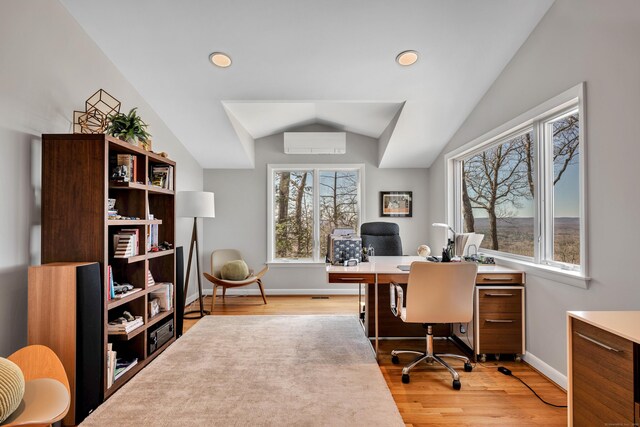 29 Montevideo Rd, Avon, CT 06001 - home office featuring light wood-style floors, lofted ceiling, an AC wall unit, and baseboards