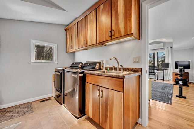 29 Montevideo Rd, Avon, CT 06001 - laundry area featuring washer and clothes dryer, cabinet space, and baseboards