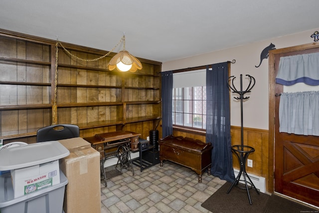 42 Sycamore Ter, Windham, CT 06280 - office space with wooden walls, a baseboard heating unit, wainscoting, and brick patterned floors