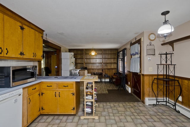 42 Sycamore Ter, Windham, CT 06280 - kitchen featuring dishwasher, stainless steel microwave, refrigerator, a peninsula, and brick patterned floors