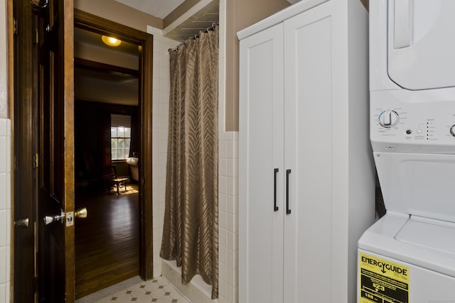 42 Sycamore Ter, Windham, CT 06280 - laundry room featuring stacked washing machine and dryer