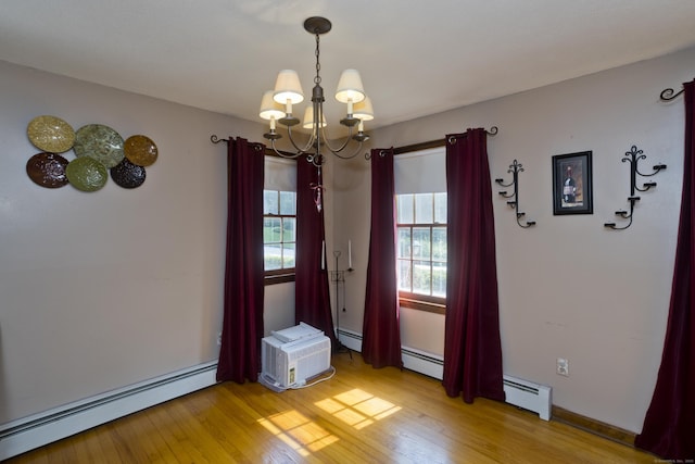 42 Sycamore Ter, Windham, CT 06280 - empty room featuring baseboard heating, a chandelier, and light wood finished floors