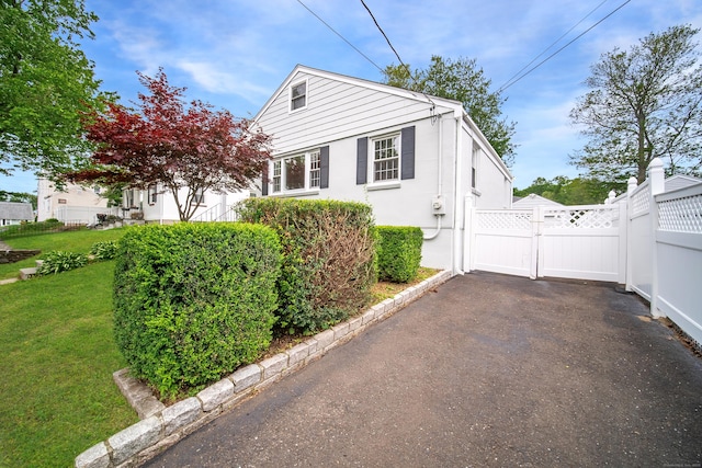 43 Breyer Ave, Bridgeport, CT 06606 - view of home's exterior featuring a gate and stucco siding