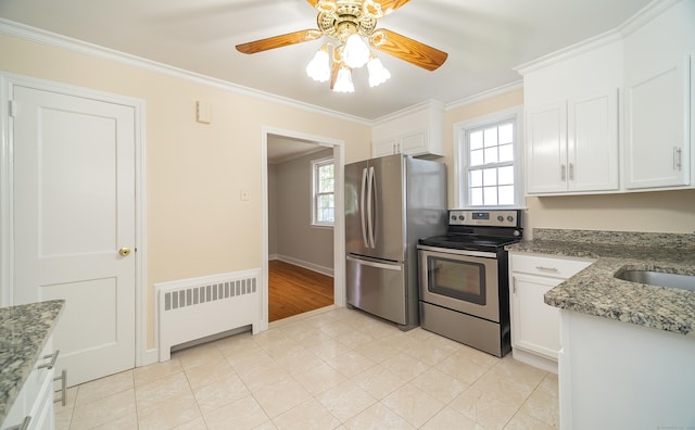 43 Breyer Ave, Bridgeport, CT 06606 - kitchen with appliances with stainless steel finishes, radiator, ceiling fan, ornamental molding, and white cabinets