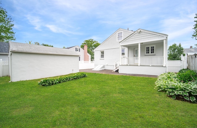 43 Breyer Ave, Bridgeport, CT 06606 - rear view of property featuring a porch and stucco siding