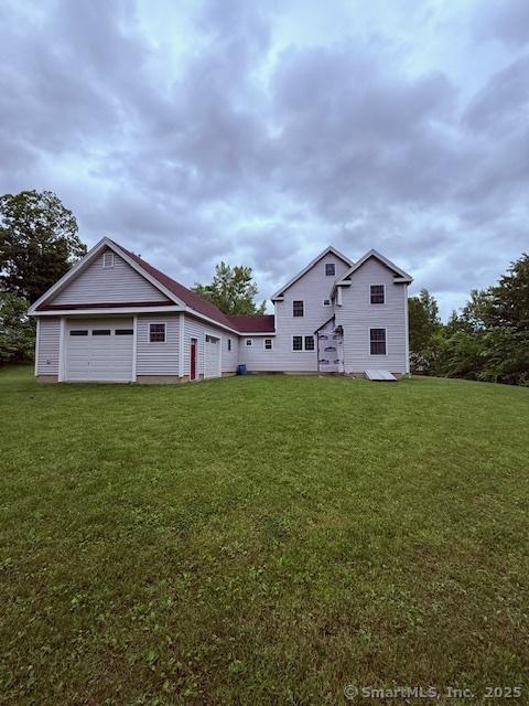15 Suffield St, Windsor Locks, CT 06096 - back of property with a yard