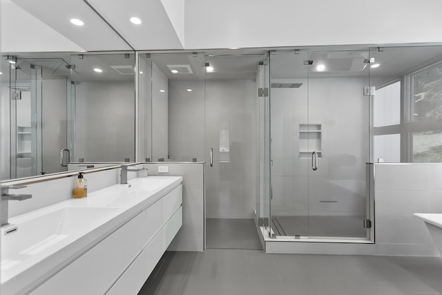 326 Georgetown Rd, Weston, CT 06883 - bathroom with double vanity, a shower stall, tile patterned flooring, recessed lighting, and a freestanding bath