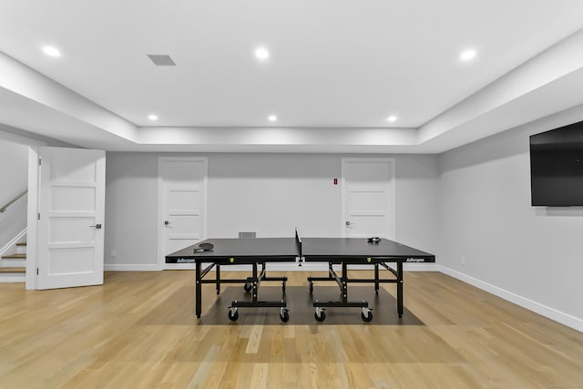 326 Georgetown Rd, Weston, CT 06883 - game room with baseboards, light wood-type flooring, recessed lighting, and a tray ceiling