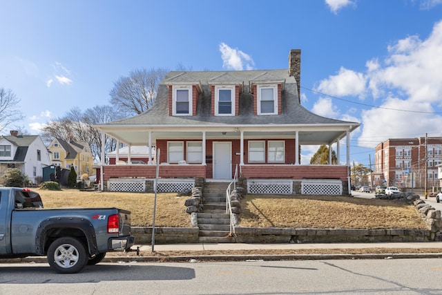 209 Pequot Ave, New London, CT 06320 - farmhouse featuring a chimney, a shingled roof, and covered porch
