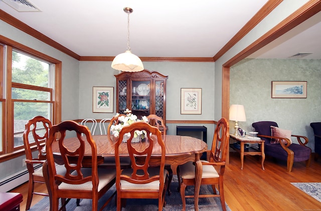 43 Redwood Cir, Shelton, CT 06484 - dining area featuring light wood-type flooring and ornamental molding