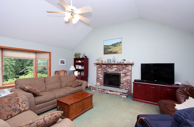 43 Redwood Cir, Shelton, CT 06484 - living area with carpet floors, lofted ceiling, a ceiling fan, and a fireplace