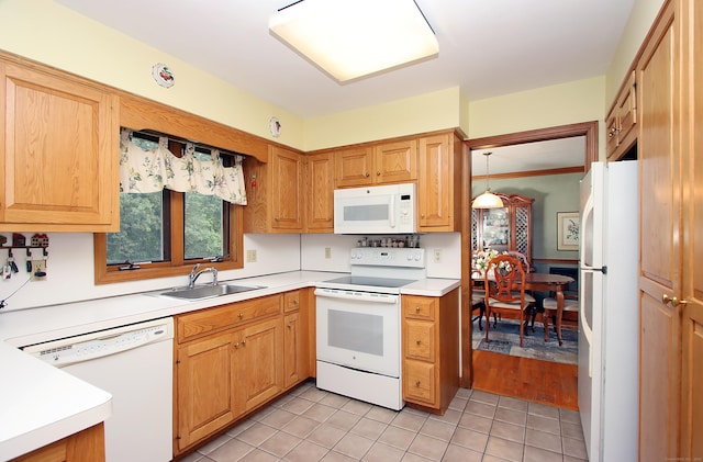 43 Redwood Cir, Shelton, CT 06484 - kitchen with white appliances, light tile patterned floors, and light countertops